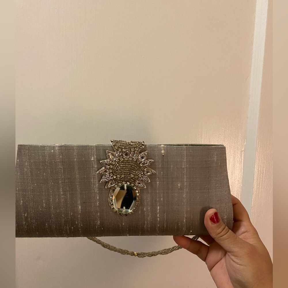 Raw silk silver clutch